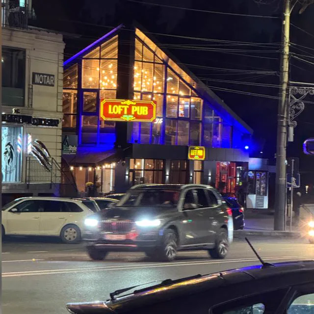 Loft Pub Botanica at night